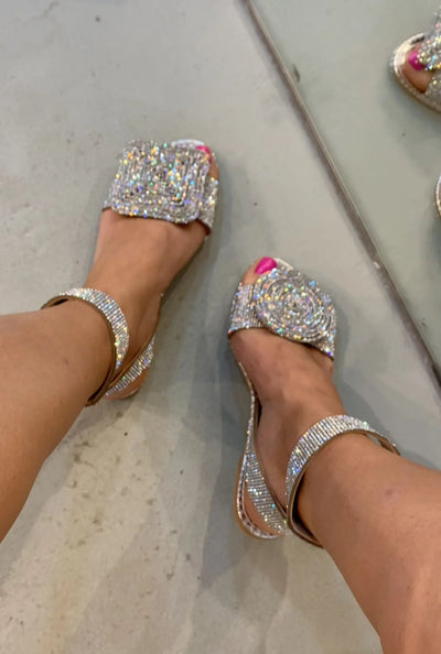 Linzey Asymmetrical low sandals with sparkling rhinestones