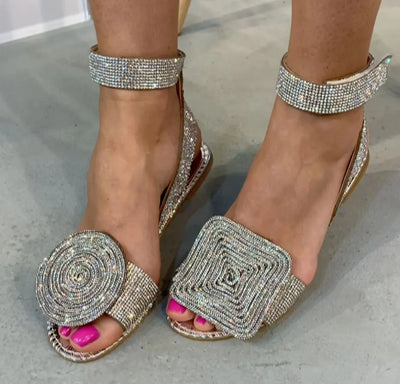 Linzey Asymmetrical low sandals with sparkling rhinestones