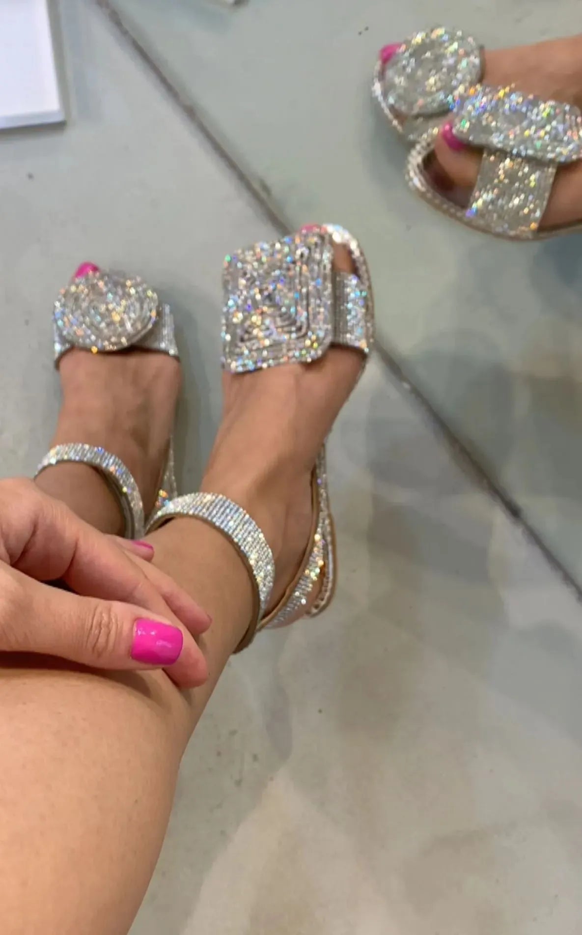 Linzey Asymmetrical low sandals with sparkling rhinestones